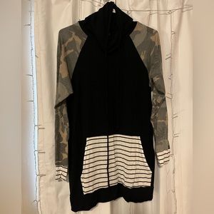 Camo, black and white striped, and black long sleeve with pockets